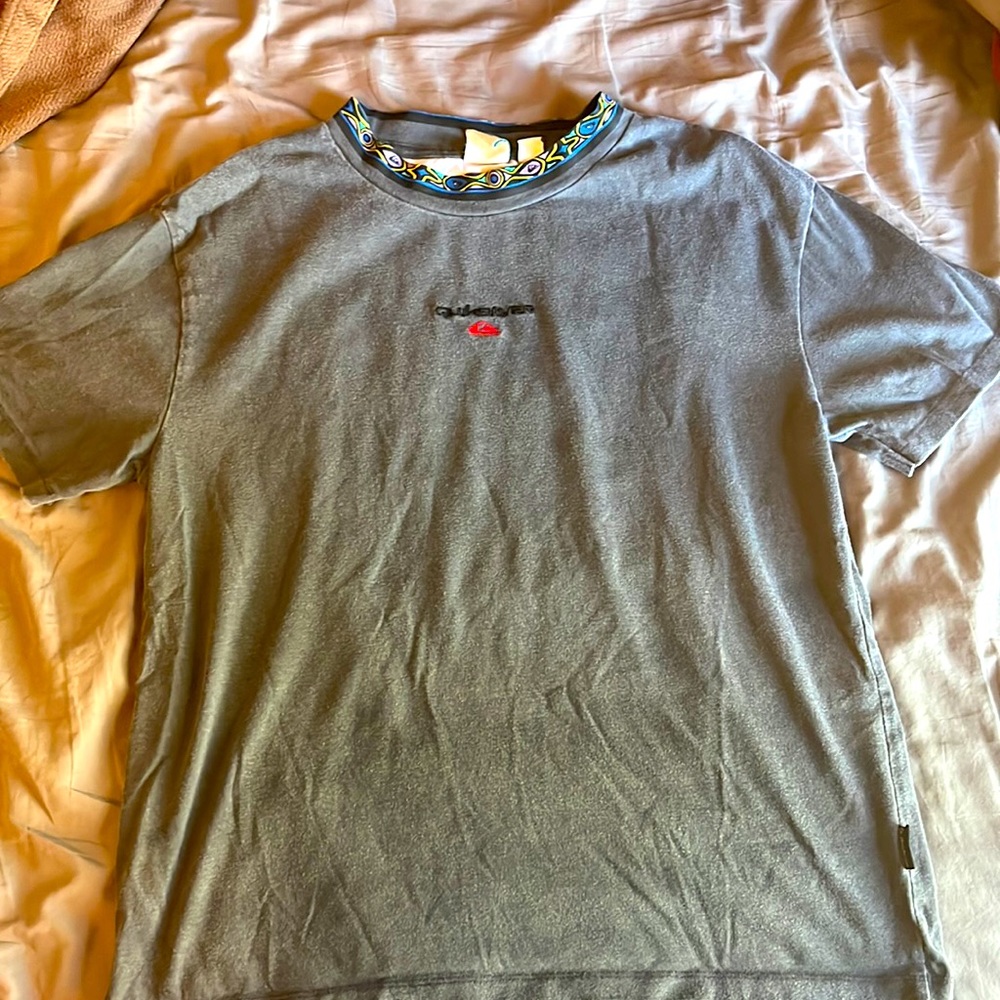 Washed out grey quicksilver tshirt, size small but fits a medium